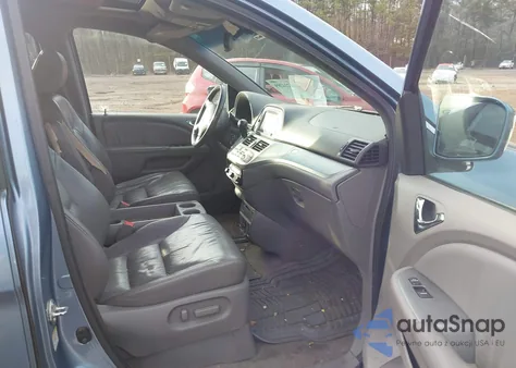 2010 Honda Odyssey Ex-L z USA, uszkodzony, nr VIN 5FNRL3H71AB094152